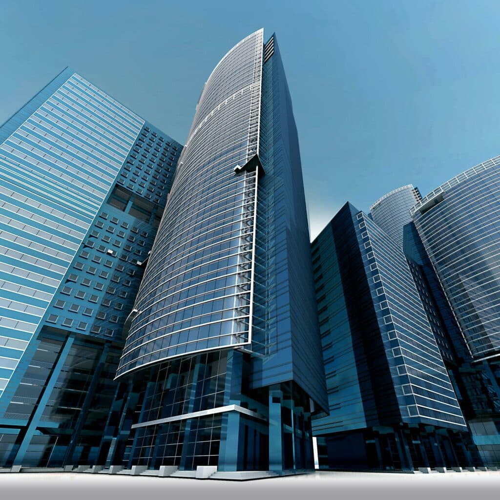 Futuristic urban skyscrapers with glass facades reflecting a vibrant blue sky.